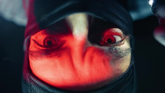 Thief With Balaclava Is Forcing The Lock Safe Door Of A Jewelry Store