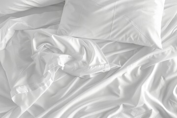 Messy bed idea with rumpled white sheets and pillow