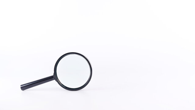 Black magnifying glass with handle on white background. Society questions, looking for answers.