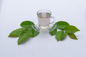 Bay leaf tea on white background, traditional medicine bay leaf