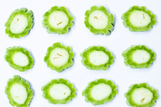 pieces of balsam pear bitter melon isolated on white background