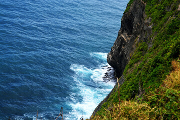 The moment when you want to feel the beauty and harmony of sea waves around Pura Uluwatu in Bali....