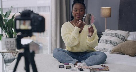 Blog, woman and influencer with makeup in home for product review, vlogger and beauty routine in bedroom. Skincare, black person and live streaming with instructions, discussion or cosmetics tutorial