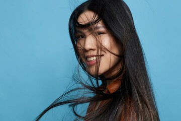 Blue woman trendy attractive portrait girl asian beauty happy smile studio lifestyle background