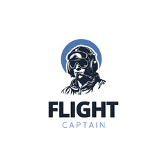 Illustration of pilot helmet,flight captain logo,Flight academy vector round emblem © keenan