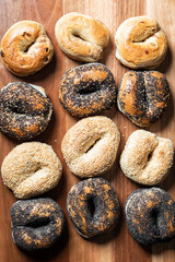 Variety of Delicious Bagels Displaying on a Wooden Table