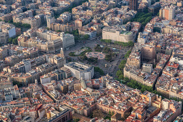 Aerial view of Placa de Catalunya with typical urban grid and streets, Barcelona - 739670584
