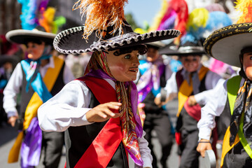 Mexican carnival, Mexican dancers recognized as "huehues" with bright typical Mexican costumes in Mexico