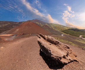 Panoramic wide view of the active volcano Etna, extinct craters on the slope, traces of volcanic activity. Mount Etna, Sicily is the highest active volcano in Europe 3329 m in Italy. - obrazy, fototapety, plakaty