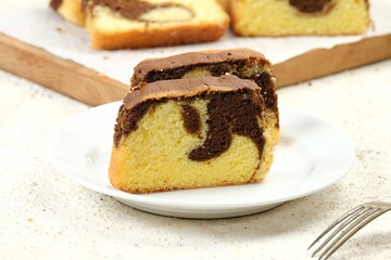 Delicious Sweet Homemade Chocolate and Vanilla Marble Loaf Cake.on wooden board	