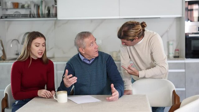 Family members giving advice to old man and discussing inheritance. Family members discussing inheritance. High quality 4k footage