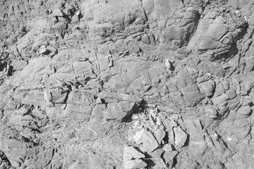 Black and white rock surface texture. Weathered stone background.