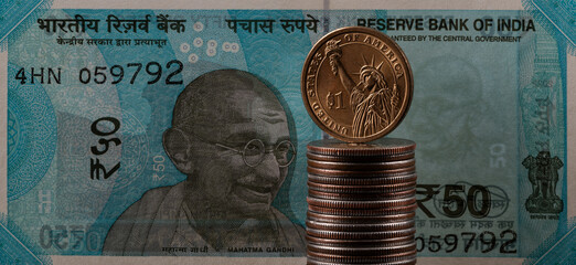 Bank of India 50 rupees note and 1 US dollar coin