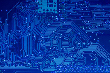 blue printed motherboard. computer electronic circuit board. closeup view.