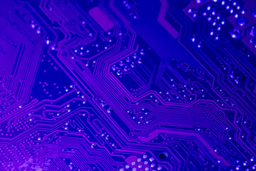 computer mainboard. electronic technology background. toned blue. macro shot.