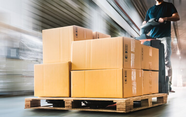 Fast Motion Speed of Workers Unloading A Package Boxes on Pallets in Warehouse. Electric Forklift Pallet Jack Loader.  Supplies. Supply Chain Shipment Goods. Distribution Warehouse Shipping Logistics
