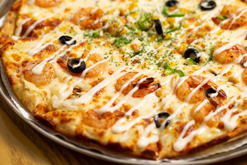 pizza on a wooden table