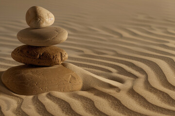 Fototapeta na wymiar Tranquil scene of Zen stones and sand in perfect harmony