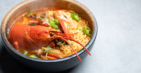 Spicy ramen with lobster in a bowl