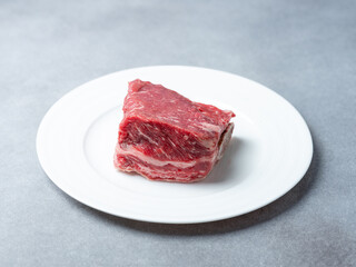 Fresh raw ribs on a plate