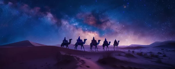 Türaufkleber Camels carrying a caravan over sand dunes beneath the Milky Way a moment frozen in time hinting at the universes wonders © Atchariya63