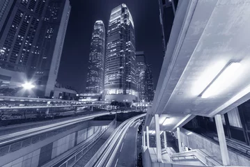 Foto op Plexiglas Skyscraper in downtown of Hong Kong city at night © leeyiutung