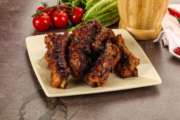 Grilled pork ribs in barbecue sauce