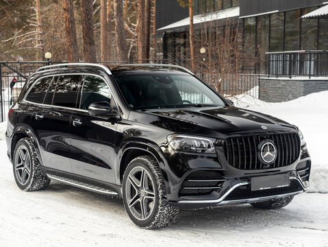Novosibirsk, Russia - February  13 , 2024:  black Mercedes-Benz GLS-Class, parked in  park, front  view