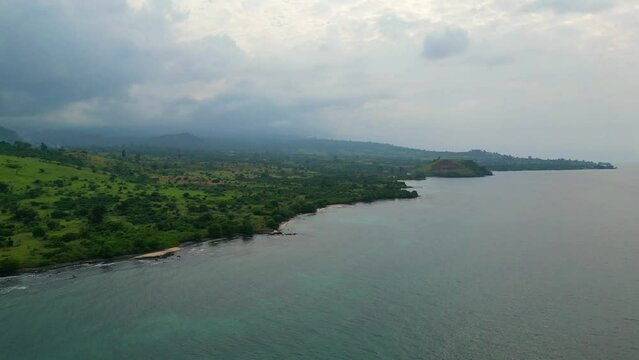 Aerial view from the São Tomé coast with Tamarindos beach as background, Africa. Drone shot