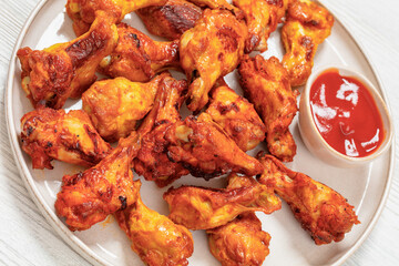 spicy crispy grilled chicken wings, top view