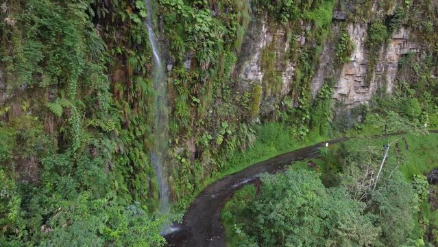 Waterfalls on overhanging section of Yungas 'Death' Road in Bolivia