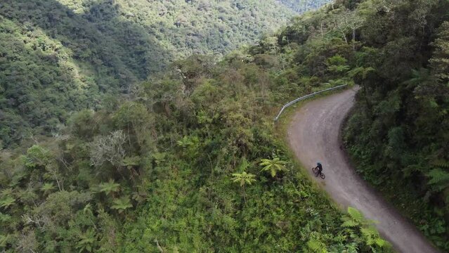 Aerial tracks bicycles on famous Yungas Rd, Death Road in Bolivia mtns