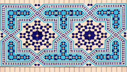 Detail of traditional persian mosaic wall with geometric ornament of blue, dark blue and yellow...