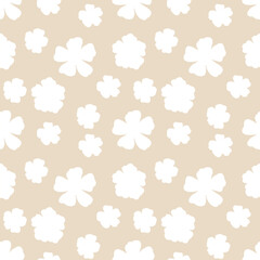 Watercolor floral seamless pattern. Hand drawn silhouette of white flowers flowers on a beige background. Botanical print for scrapbooking, printing on fabrics, packaging and other designs.