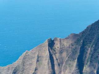 Close-up photo of a rocks at Na Pali Coast near Kalalu Valley, Kokee State Park State Park, Island of Kauai, Hawaii