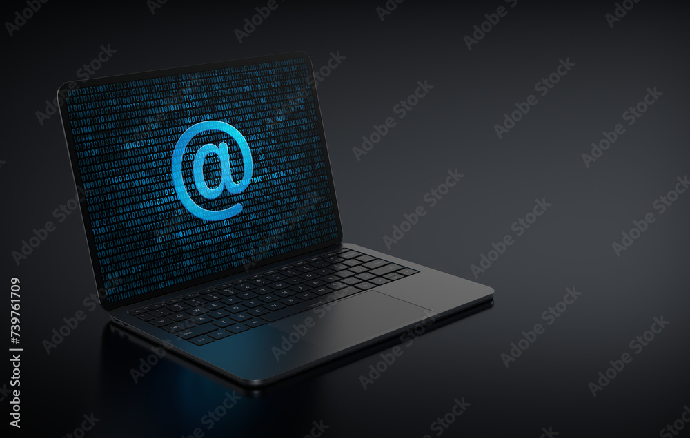 Poster laptop device in the left side positioned diagonally with at-sign address icon in screen on a dark b