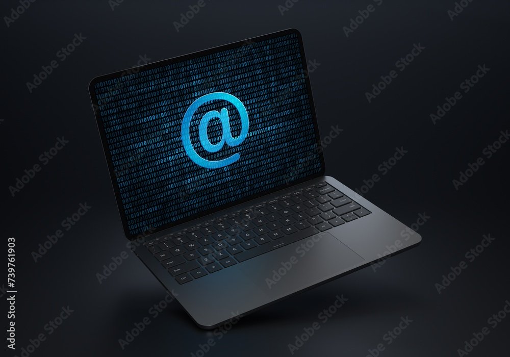 Wall mural Laptop device on a dark background with a stylish angled placement showing an At-Sign address icon on the screen. Realistic rendering. - Wall murals