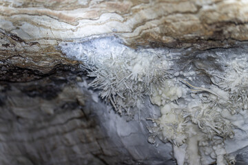 Intricate Crystal Formations in a Mysterious Cave Interior