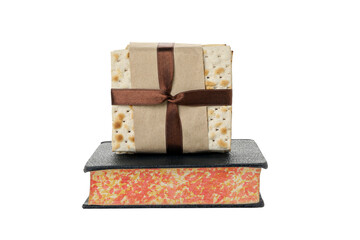 PNG, matzo on the Torah, isolated on white background