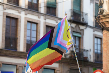 Progressive gay flag during the demonstration for gay and LGBTQ rights in the city of Seville,...