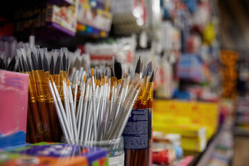 Paint brush assortment on display of creative stationery store