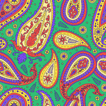 Seamless pattern with colorful Paisley motifs on green background. Traditional indian repeat design.