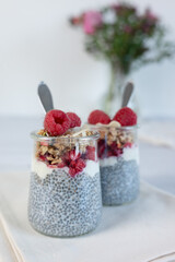 Home made chia pudding with granola and berries. Selective focus.