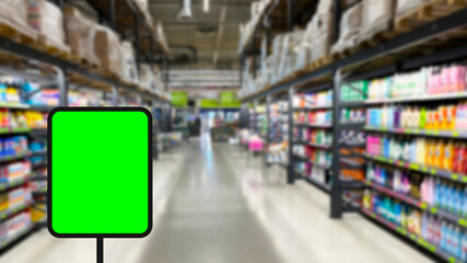 Blurred background Supermarket and green sign. Business background. Copy space.