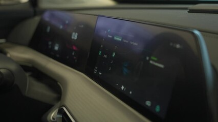 Close-up of an electronic dashboard in a modern car.  - Powered by Adobe