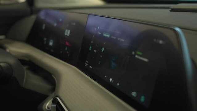 Close-up of an electronic dashboard in a modern car. 