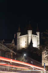 view of the old town, castel on a hill with crossing cars longexpouse