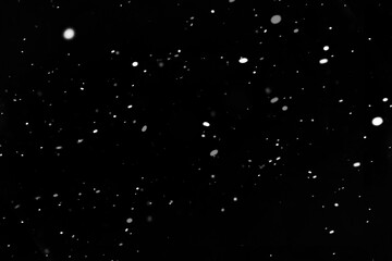 Freeze motion of white powder exploding, isolated on black background. Abstract design of white dust. abstract powder dust explosion over black backdrop. Snow, particle overlay background