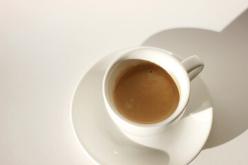 Freshly Made Espresso with Crema Foam. Drinking Coffee.