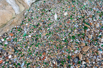 Microplastics on Sand Beach. Micro Plastics Garbage, Tiny Trash Pieces, Microplastic Waste, Dirty Shore